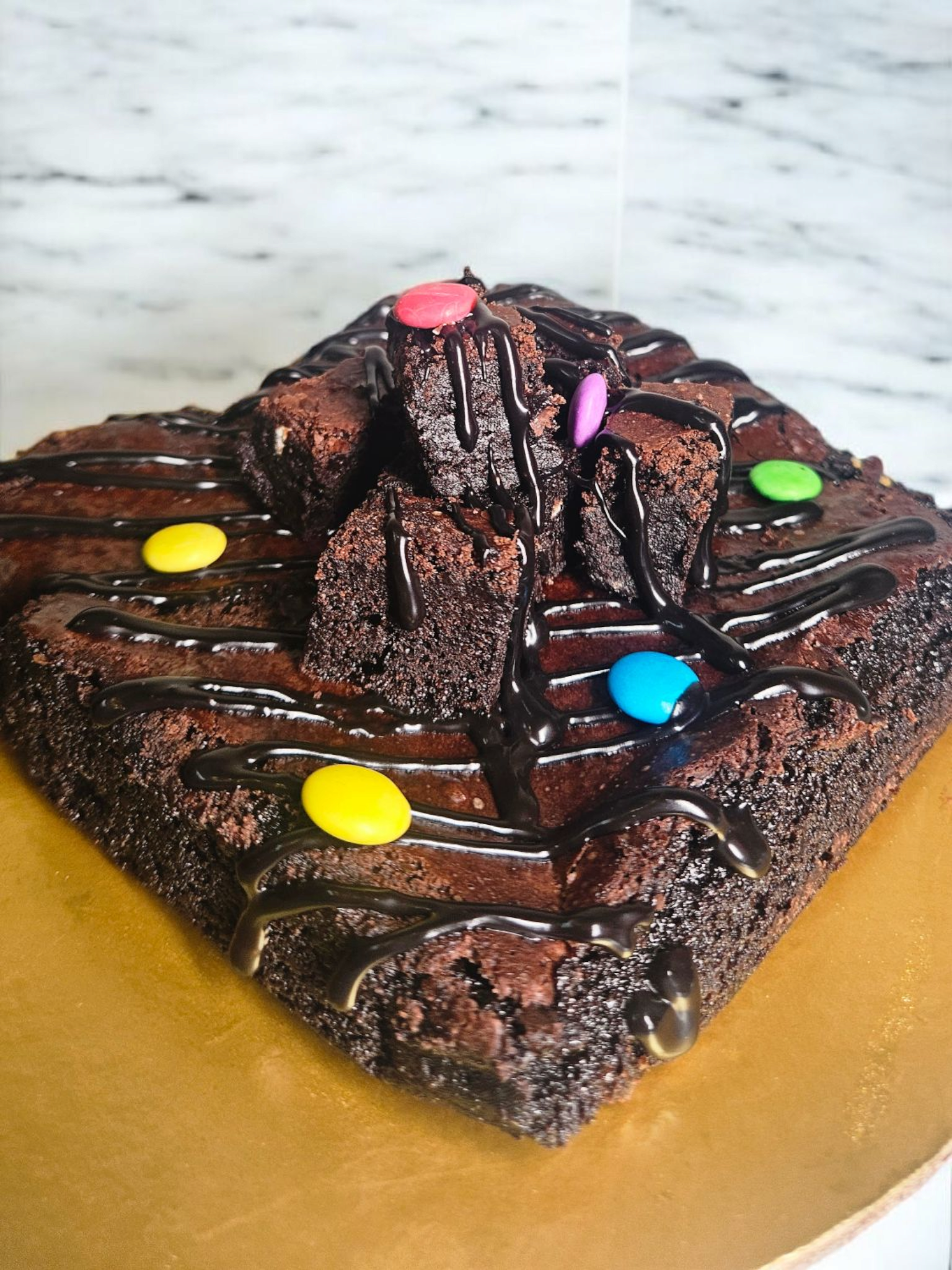 Fudgy Brownie Cake - Because celebrations should be  drenched in chocolate.